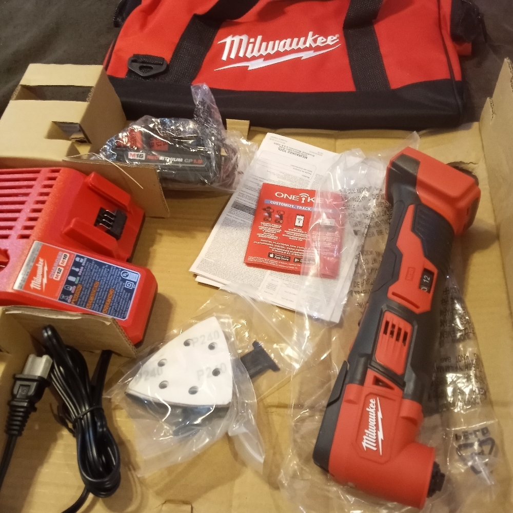 Milwaukee multi-tool set comes with battery rechargeable charging deck blades